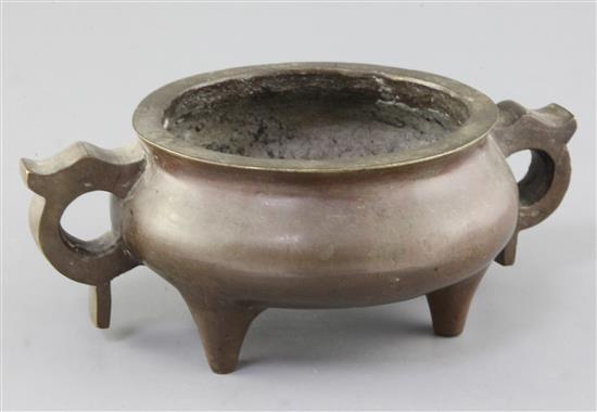 A Chinese bronze ding censer, probably 19th century, width 23.5cm